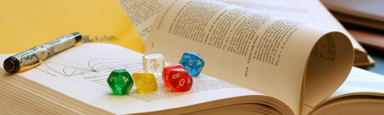 A statistics book and dice